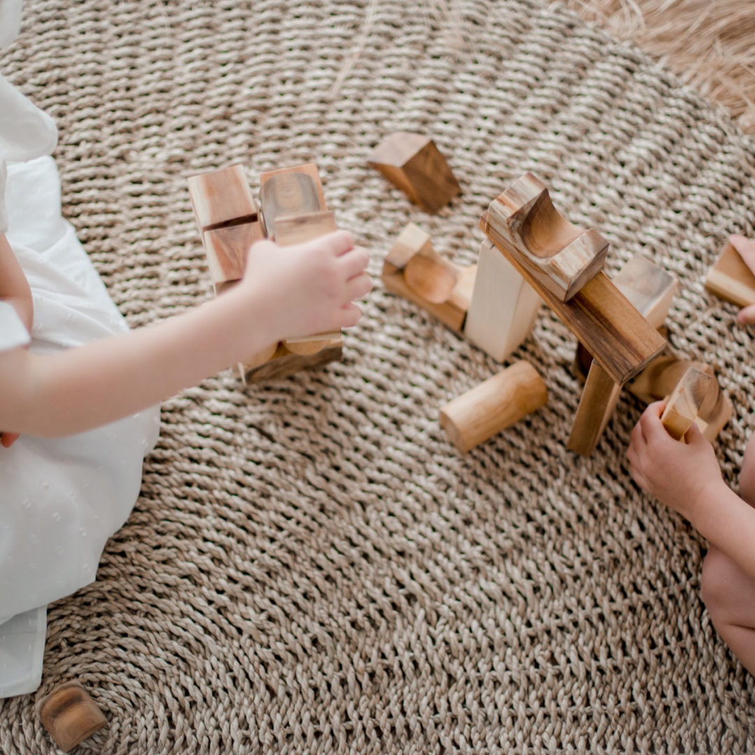 Children constructing structures using the QToys project blocks building blocks
