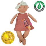 Bonikka doll baby Aria: Soft fabric doll with dusky pink muslin dress and pastel geeen headband. Brown eyes and embroided toucan on her dress. Moms choice award winner and organic 100 standard stamp