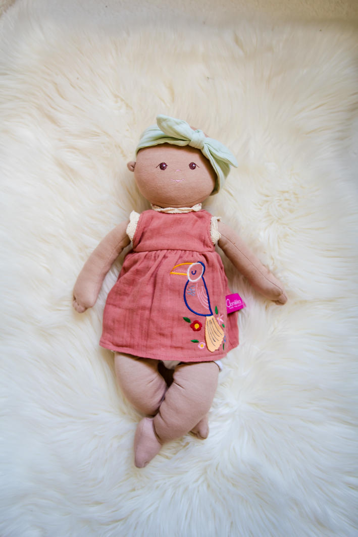 Baby Aria lying on a sheepskin