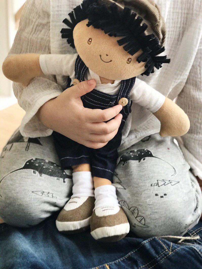 Bonikka Joe shown being cuddled by a small child