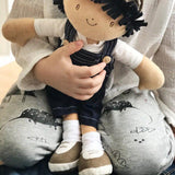 Bonikka Joe shown being cuddled by a small child