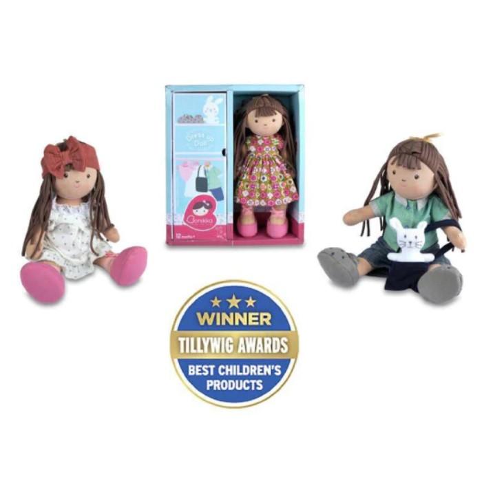 Bonikka Sofia doll displayed in gift box and 3 separate outfits shown