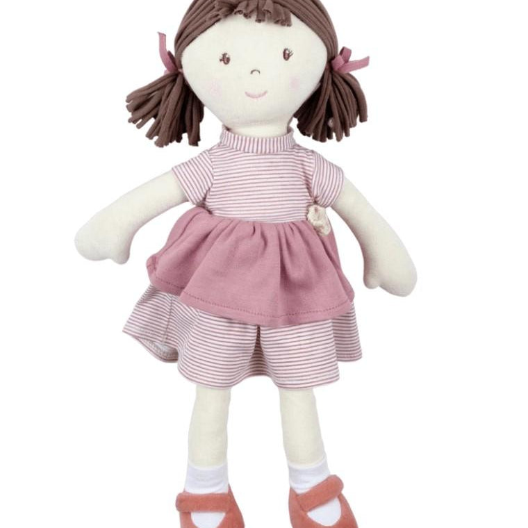 Brook doll shown with brown hair and pink ribbons with pink shoes and rose dress