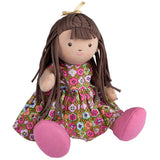 Bonikka Sofia doll with movable limbs. Fabric rag doll with brown hair and brown eyes. Wearing a floral dress and pink shoes which are removable.