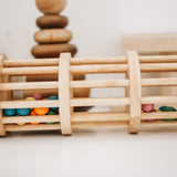 Wooden rattle rainmaker with colourful balls from QToys
