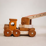 Wooden crane from QToys with hook on end of moving crane