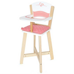Wooden Hape high chair with pink and white detailing.