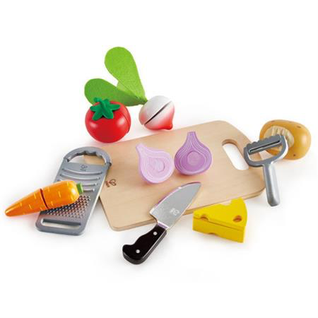 Hape cooking essentials pretend play set with potato and peeler, separable onion, sliceable cheese with knife, carrot itch grater, separable tomato and radish. Included chipping board.