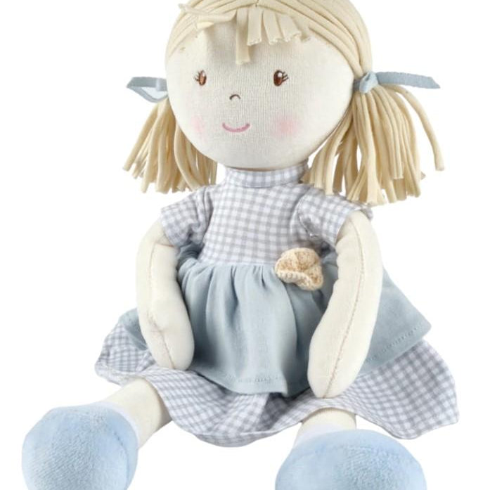 Bonikka Neva doll with blond pigtails in blue ribbons. Smiley face embroiled and blue dress with blue shoes. Soft rag doll