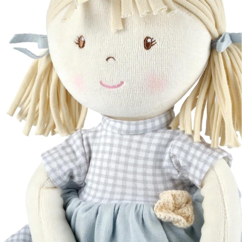 Details of small crotchet rose on dress