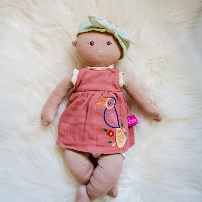 Baby Aria lying on a sheepskin