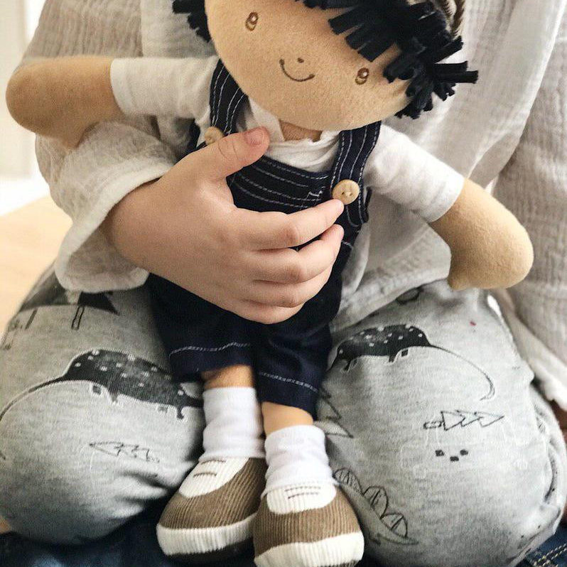 Bonikka Joe shown being cuddled by a small child