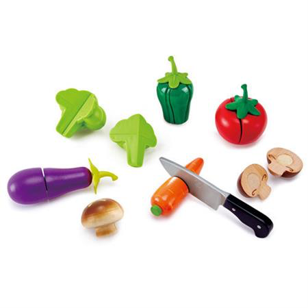 Pretend play kitchen toy food including Brocolli, green pepper, carrot, tomato, mushroom, eggplant with a knife. All vegetables are able to be cut and then stuck back together